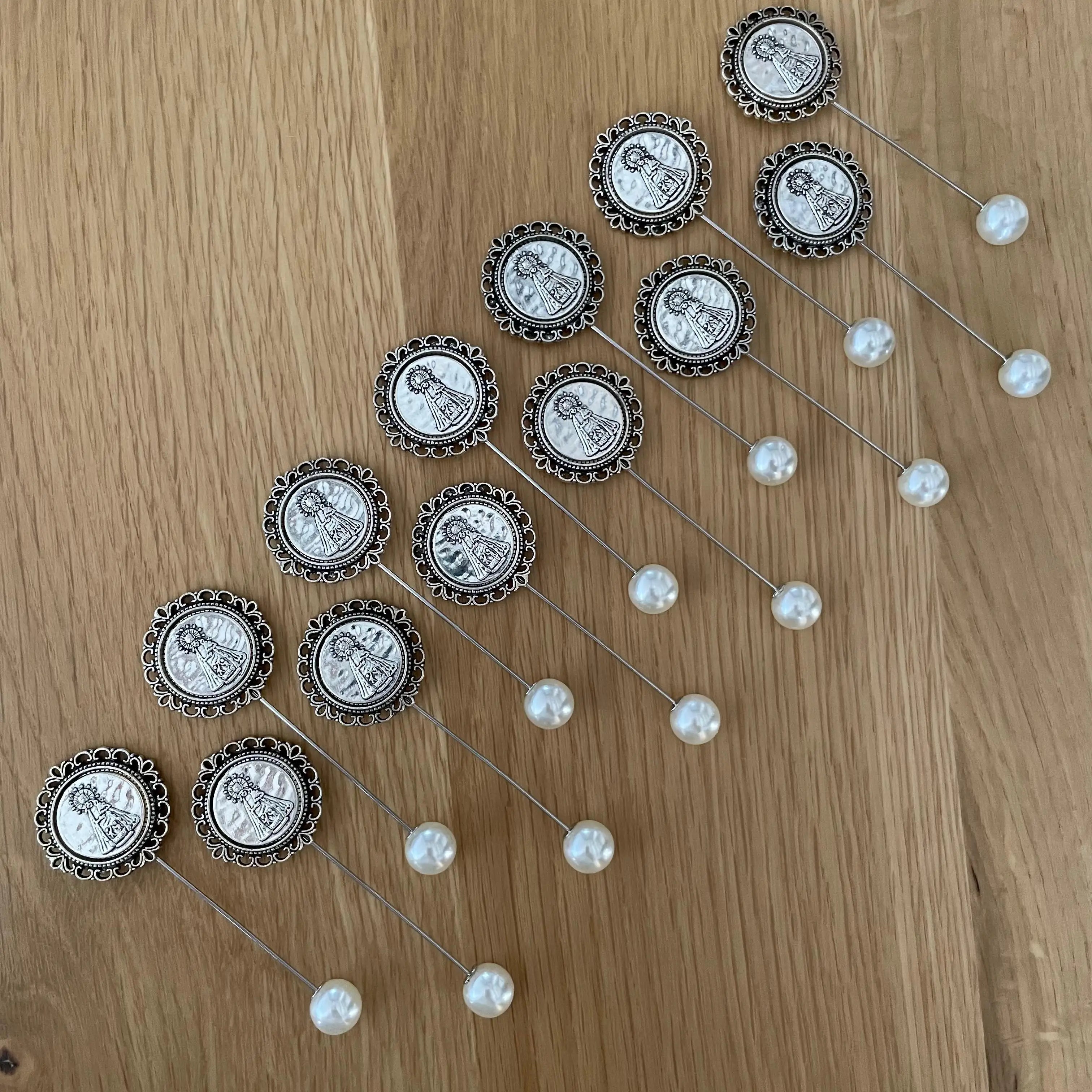 Aguja de banda Geperudeta plateada