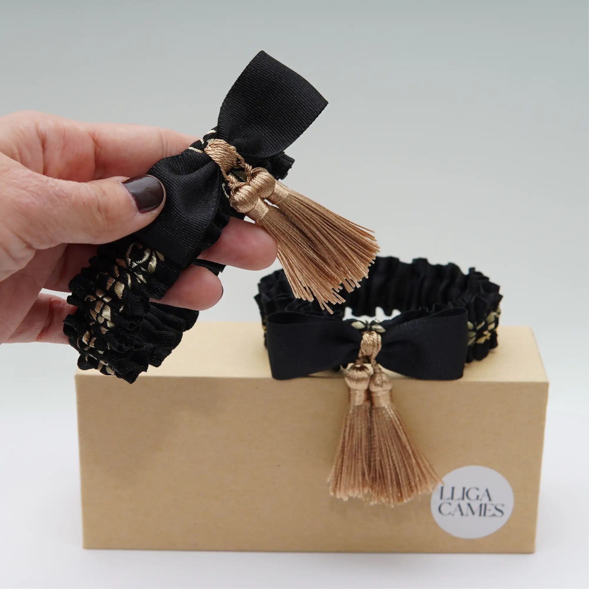 Lligacames Borles negro y dorado