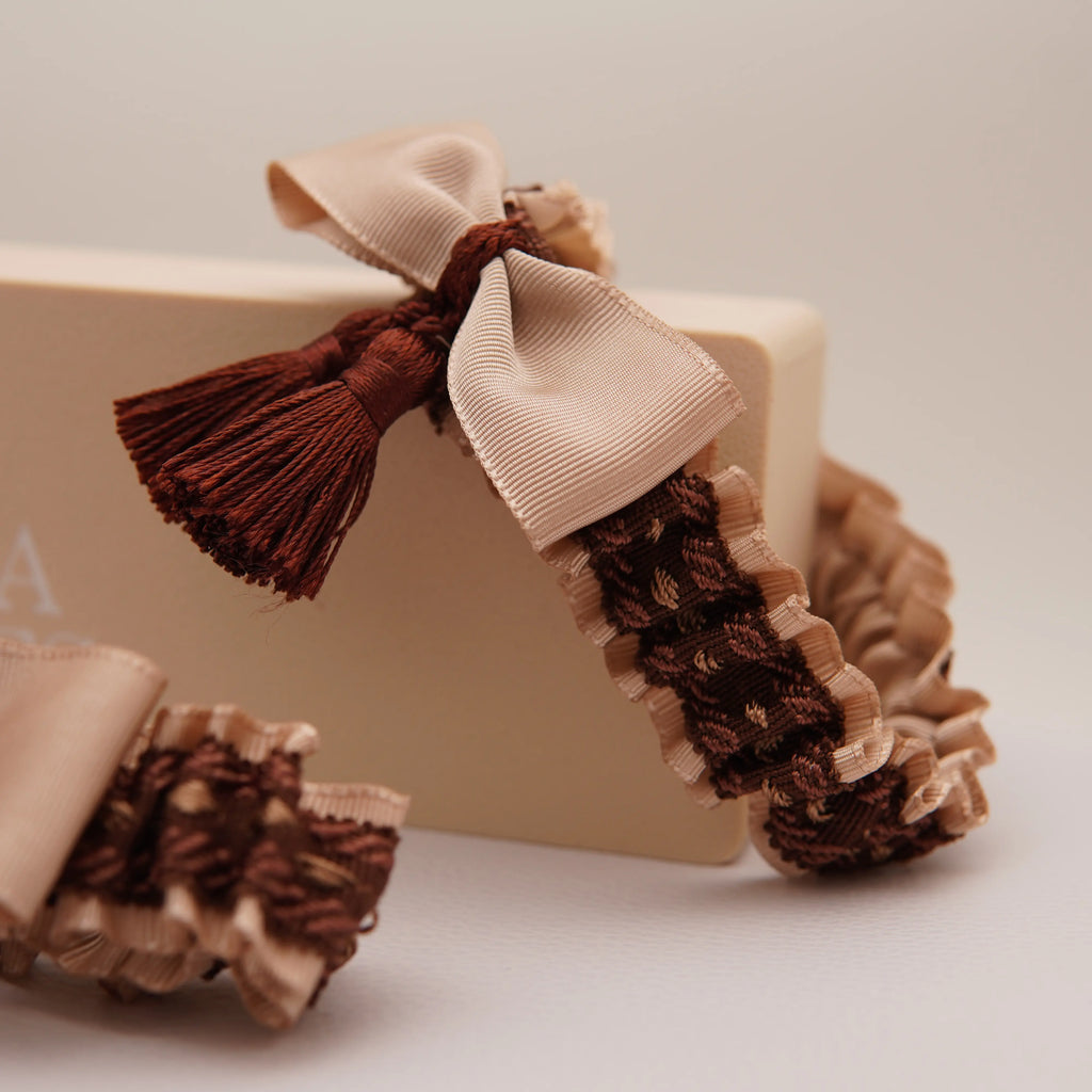 Lligacames Borles beige y marrón